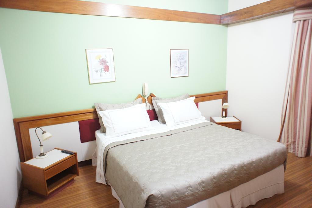 Hotel Solar Corte Real Sabara Phòng bức ảnh